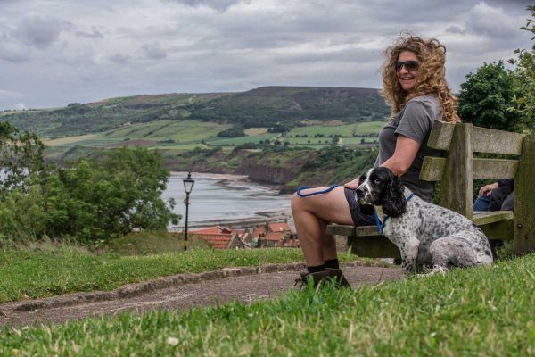 Dog walker with dog in Robin Hood's Bay_lpr-Credit Polly A Baldwin